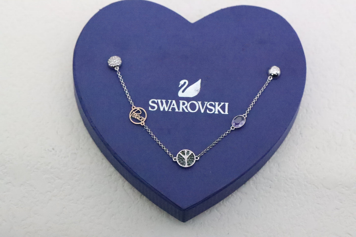Silver-rimmed black diamond arrow magnetic clasp bracelet