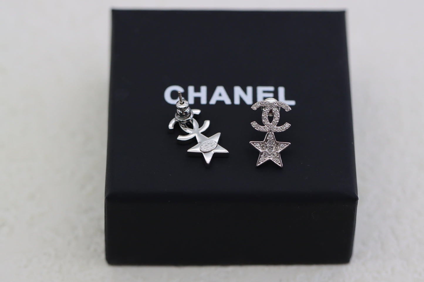 Silver diamond star double C earrings