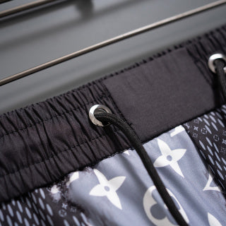 Blue and black quick-drying beach shorts