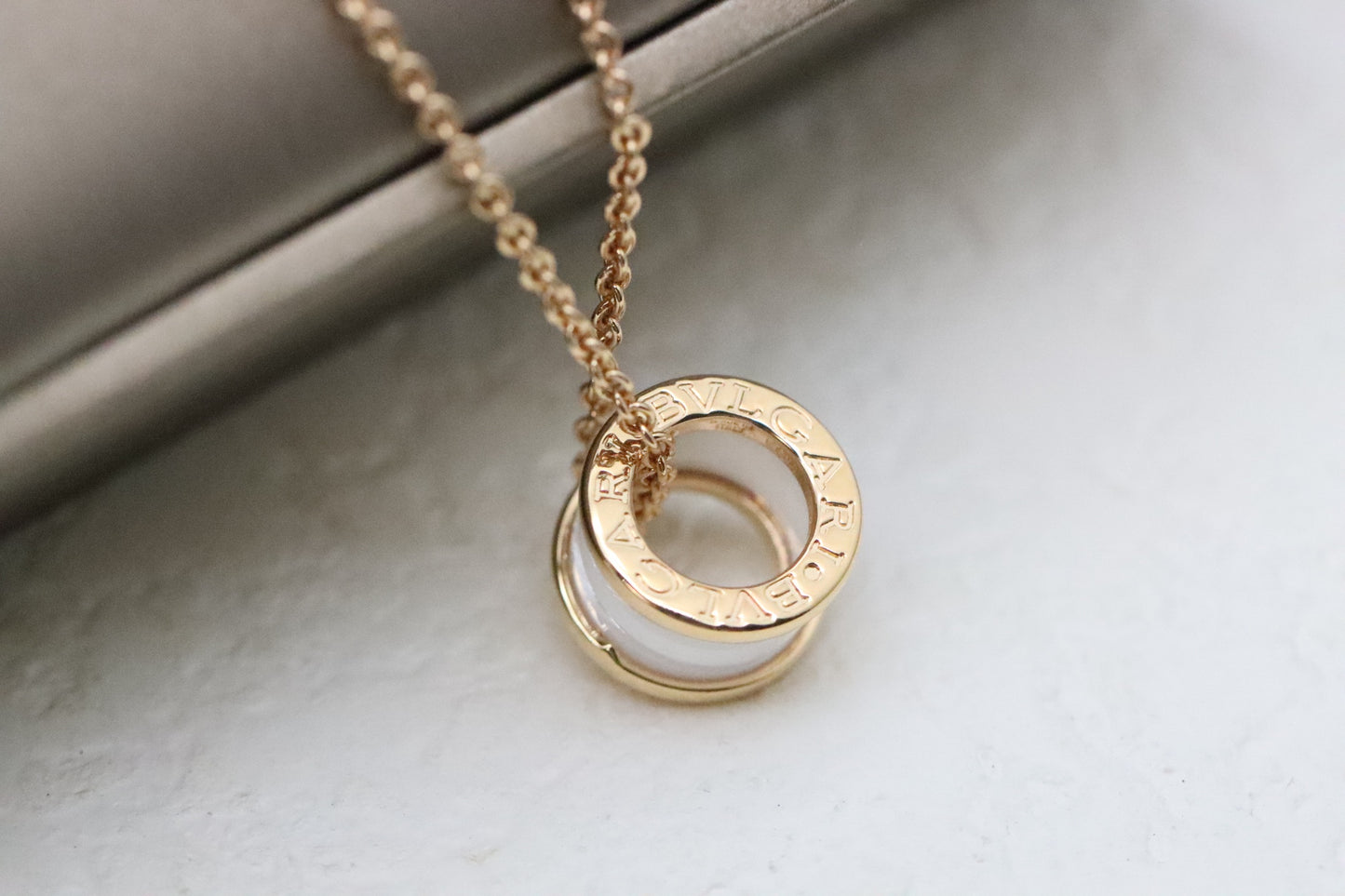 Rose gold and diamond necklace with white ceramic