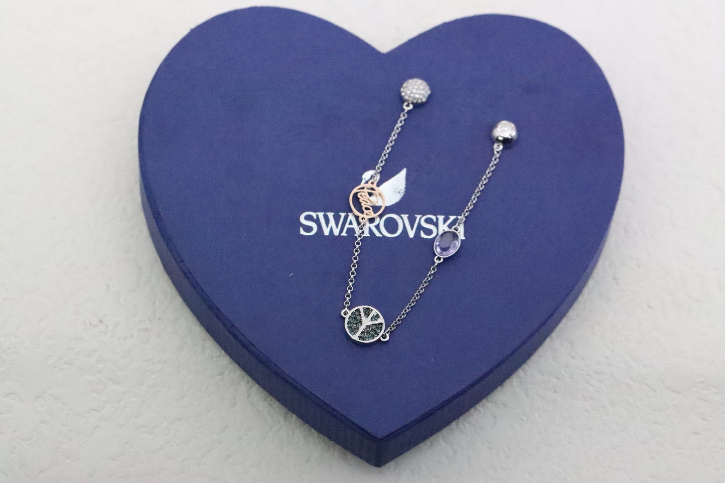 Silver-rimmed black diamond arrow magnetic clasp bracelet