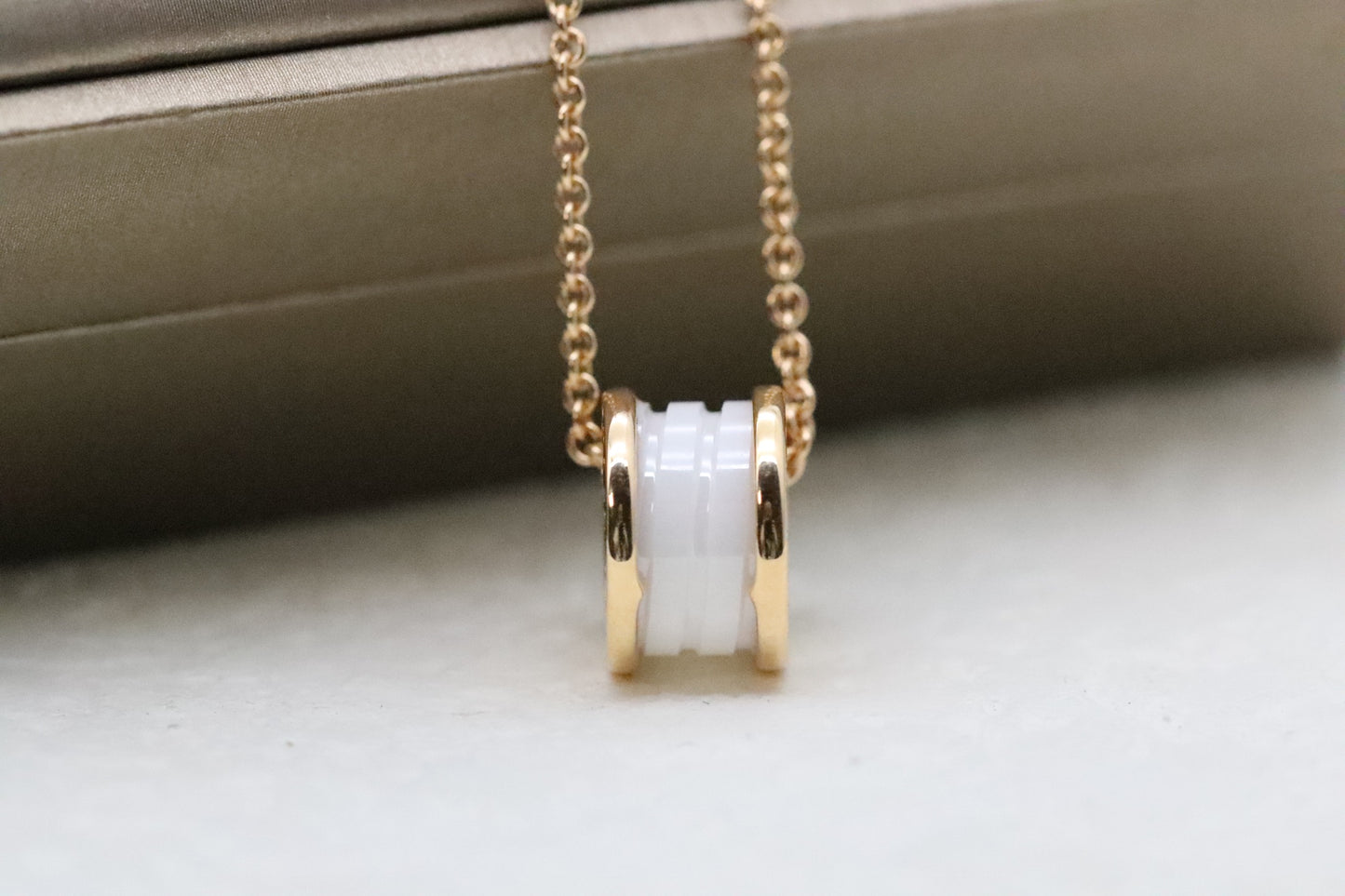 Rose gold and diamond necklace with white ceramic