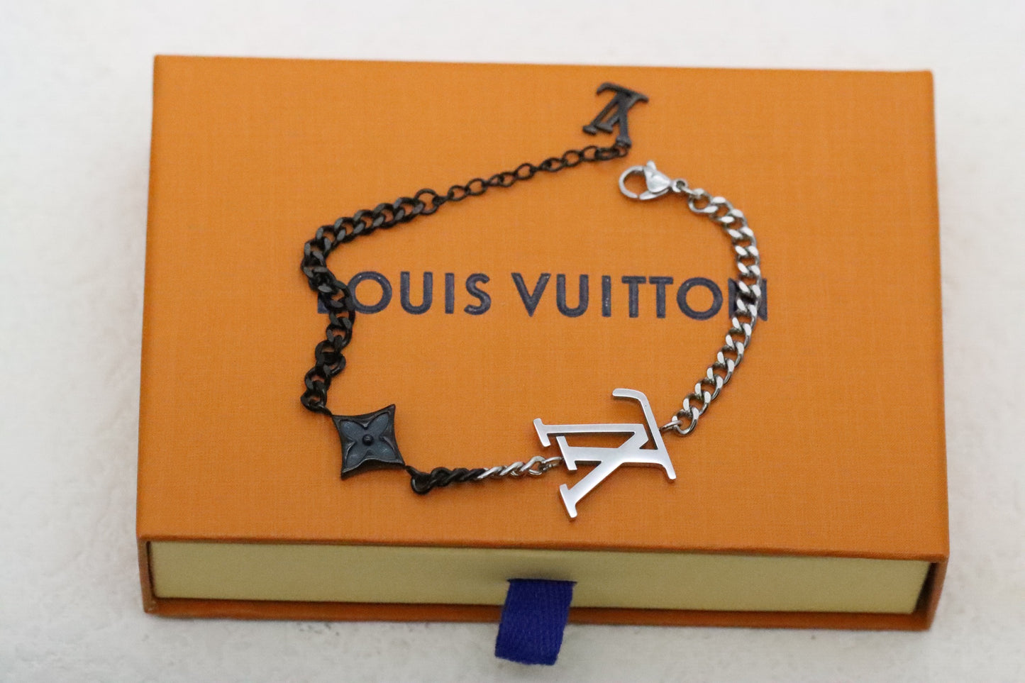 Silver and black floral and letter Cuban bracelet