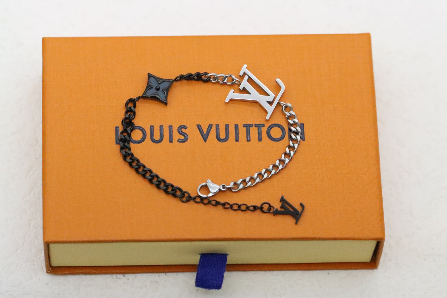 Silver and black floral and letter Cuban bracelet
