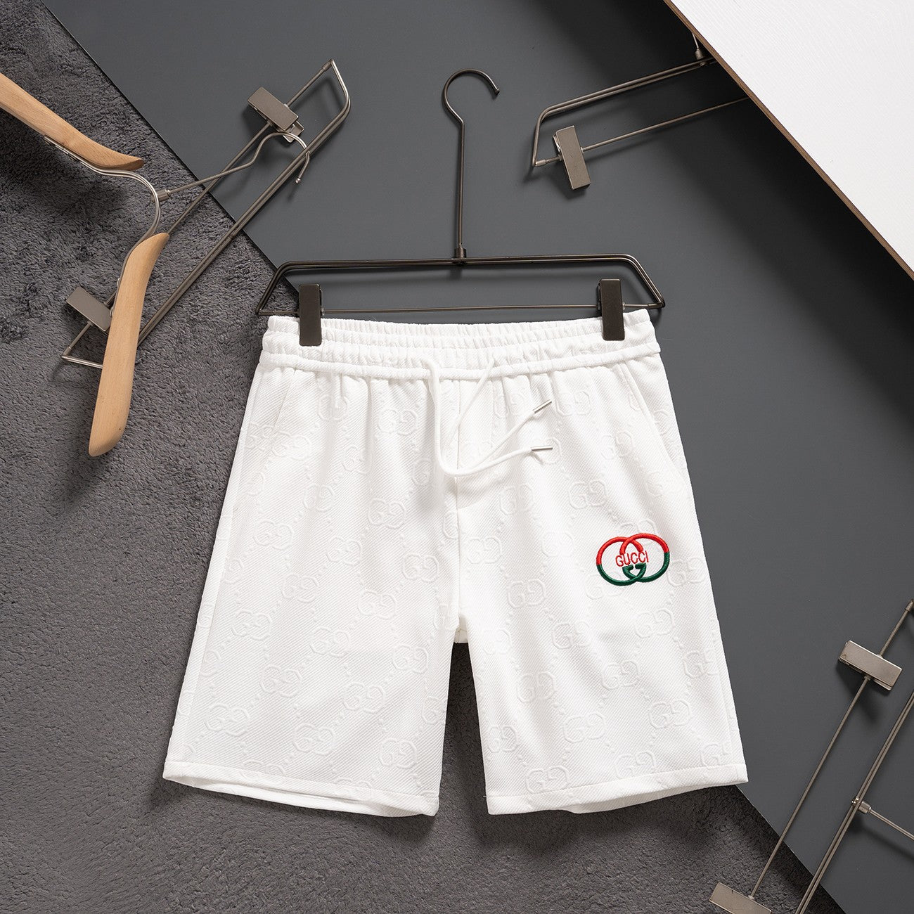 Summer shorts in various fabrics with embroidery patterns