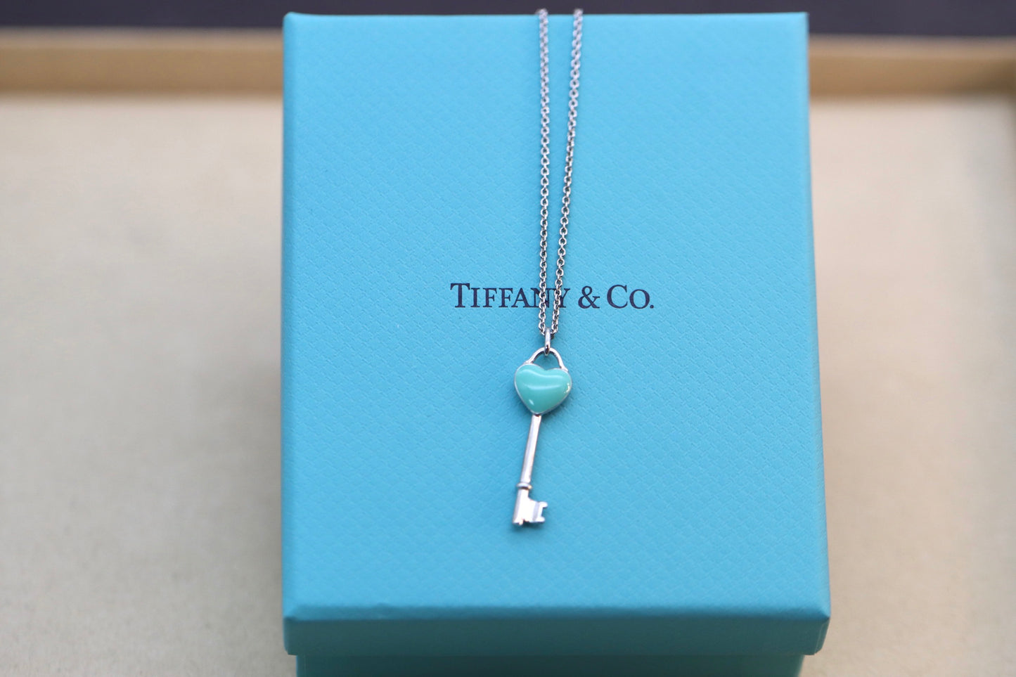 Silver and blue enamel heart key necklace