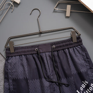 2025 latest pure black quick-drying shorts beach pants
