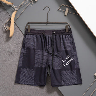 2025 latest pure black quick-drying shorts beach pants