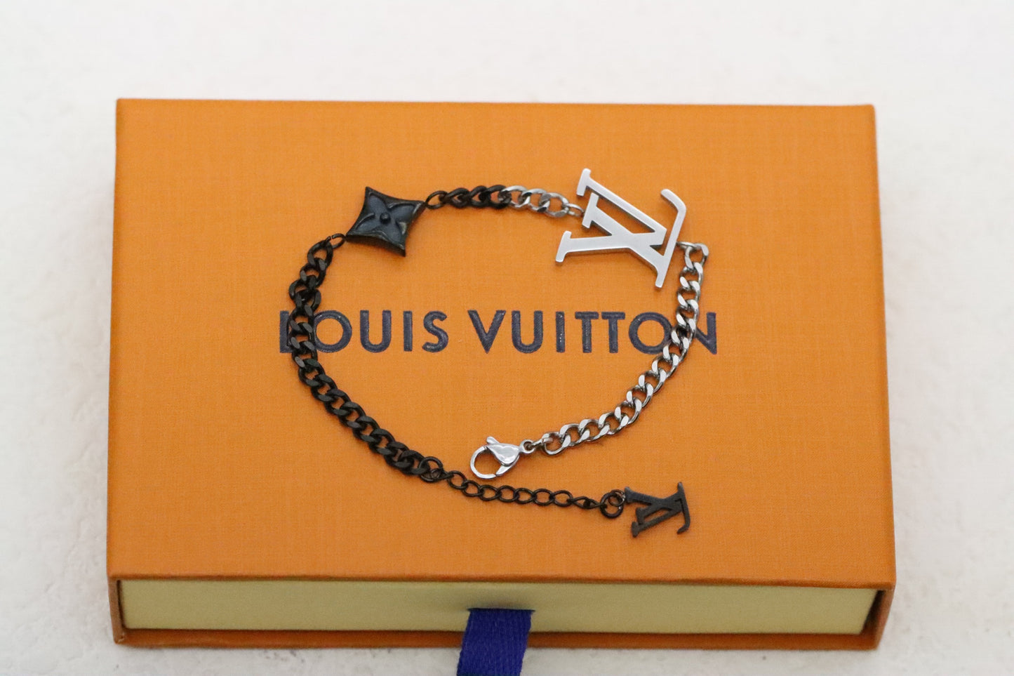Silver and black floral and letter Cuban bracelet