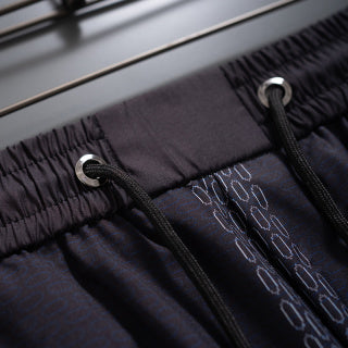 2025 latest pure black quick-drying shorts beach pants