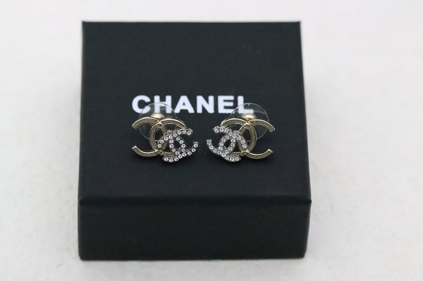 Colorblocked overlapping diamond double C earrings